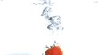 Video: Tomato submerged into water in super slow motion Tomato submerged into water in super slow motion