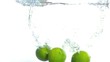 Lime falling into water in super slow motion