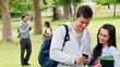 Video: Man shows a text message to his friend who laughs before the look at the camera Man shows a text message to his friend who laughs before the look at the camera