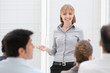 Businesswoman at presentation meeting