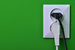 Wall outlets on the green wall