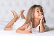 Girl lying barefoot