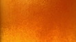 bubbles rising inside a glass of cold beer