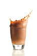 Chocolate splashing into glass