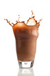 Chocolate splashing into glass