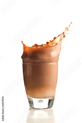 Photo: Chocolate splashing into glass Chocolate splashing into glass
