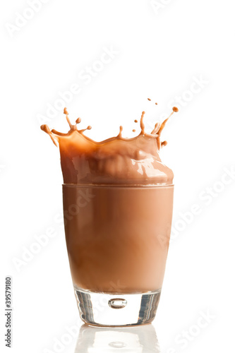 Photo: Chocolate splashing into glass Chocolate splashing into glass