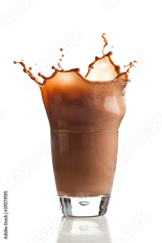 Photo: Chocolate splashing into glass Chocolate splashing into glass