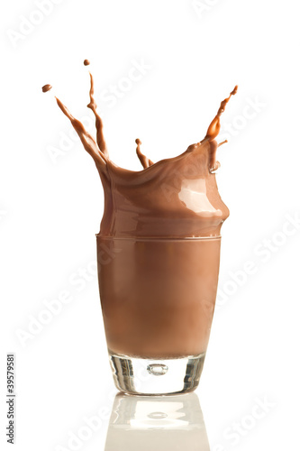Photo: Chocolate splashing into glass Chocolate splashing into glass