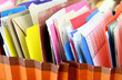 Row of folders in expending file pockets