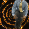 Man jumping out of focus with fire spiral background