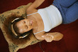 Woman laying on floor with headset
