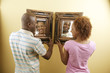 Couple holding mirror