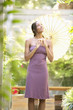 Woman holding umbrella