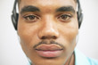 Close up portrait of man wearing headset