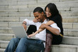 Couple sat on steps