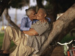 Woman kissing man