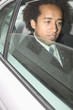 Close up of businessman in car
