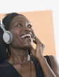 Young woman listening to headphones