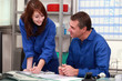 factory workers working in the office
