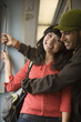 Young couple on subway train