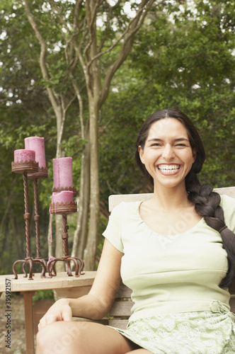 Photo: Portrait of young woman smiling Portrait of young woman smiling