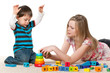 Playing on the carpet with blocks