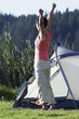 Young woman stretching outdoors
