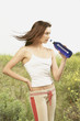Woman drinking bottled water