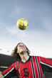 Soccer player headering the ball