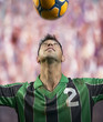 Soccer player heading the ball