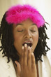 Young woman yawning