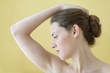 Young woman stretching her neck