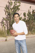 Young man playing with a football