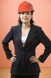 Portrait of businesswoman posing with hard hat