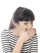 Foto: Young Woman Covering Mouth. Model Released Young Woman Covering Mouth. Model Released