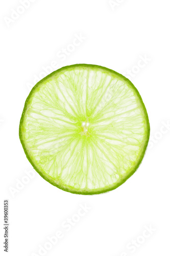 Photo: Frische Limette Scheibe isoliert Frische Limette Scheibe isoliert