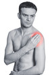 Young man holding his shoulder having ache