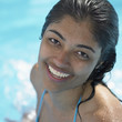 Young woman in a bikini smiling for the camera