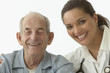 Portrait of female doctor with elderly male patient