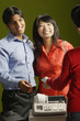 Couple making credit card purchase