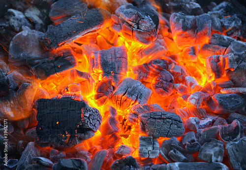 Photo: glowing charcoal, oval glowing charcoal, oval