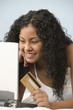 Teen girl  shopping online with credit card