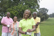 Two couples playing golf together