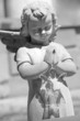 cemetery angel holding glass angel toy cemetery angel holding glass angel toy