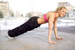 Beautiful happy fitness woman exercising