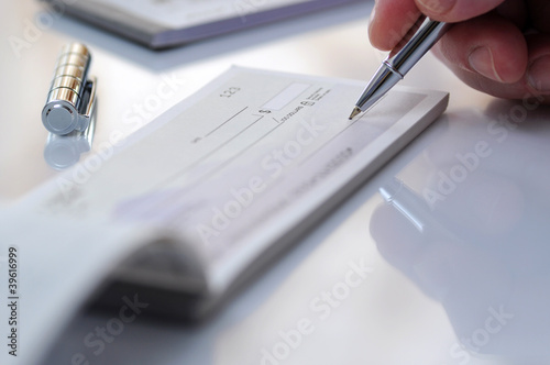 Photo: Prepare writing a check Prepare writing a check