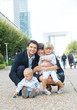 Family of four walking to city Family of four walking to city