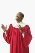Man in choir robe singing