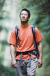 Man looking up while hiking